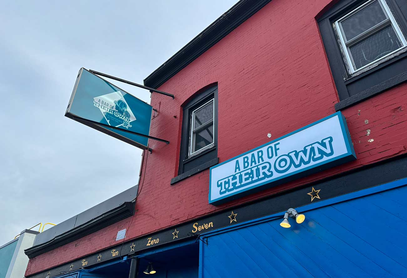 Exterior shot of A Bar of Their Own signage.