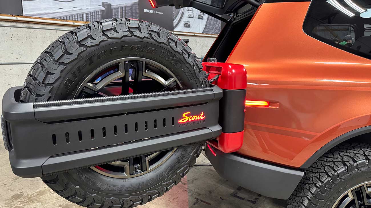 Spare tire on the back end of the Scout.