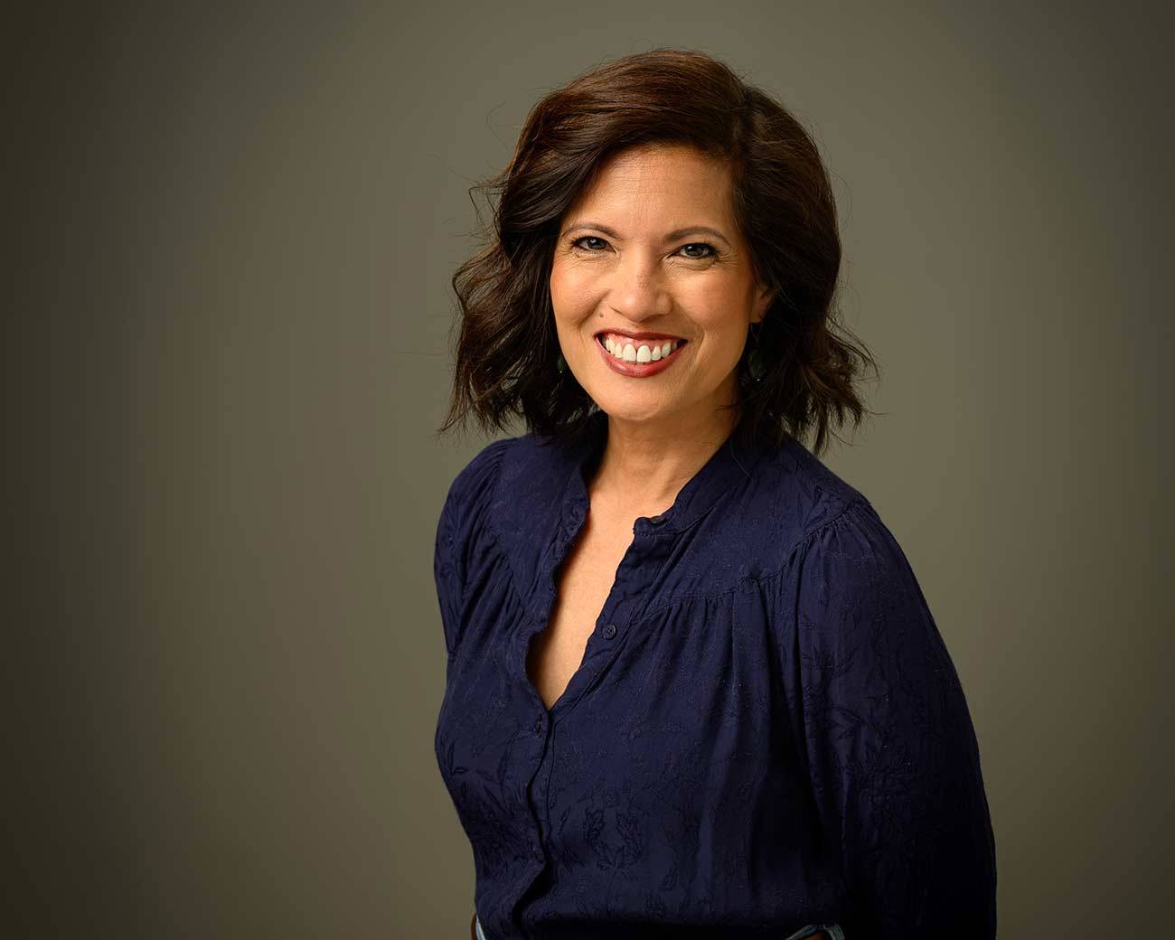 Headshot of Theater Mu's artistic director Fran de Leon.
