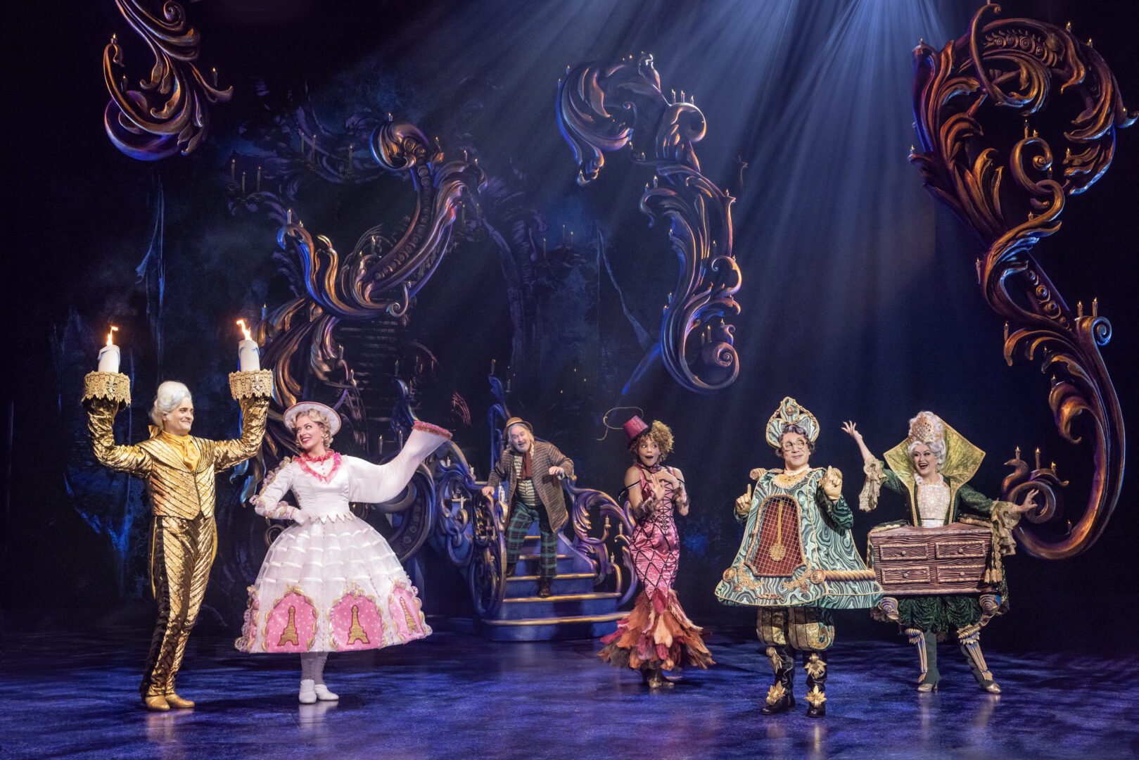 Actors dressed as enchanted objects in the stage production of Disney's "Beauty and the Beast".